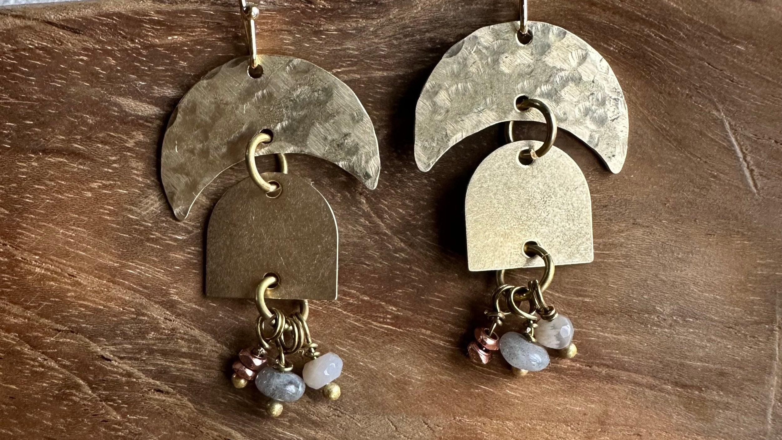 hand hammered brass crescent dangles with gemstones